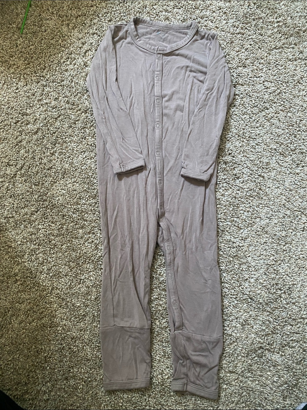 Kyte Baby unisex romper with a snap closure.